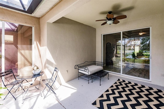 view of patio with ceiling fan