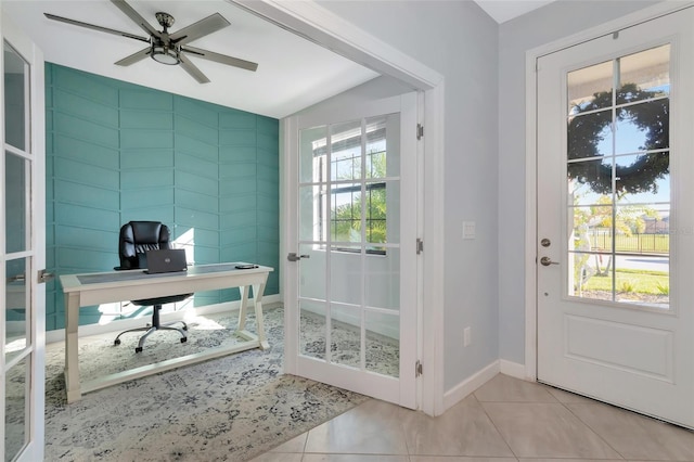 tiled office featuring ceiling fan