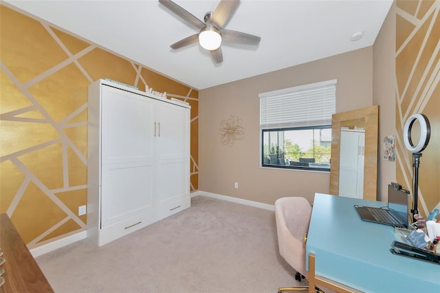 office featuring carpet floors and ceiling fan