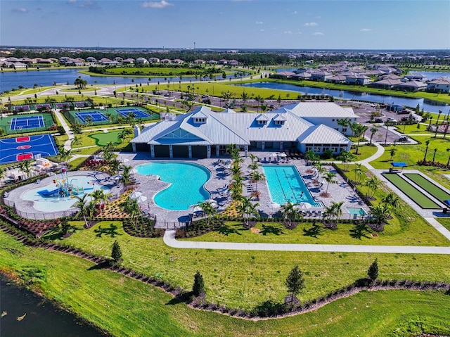 drone / aerial view with a water view