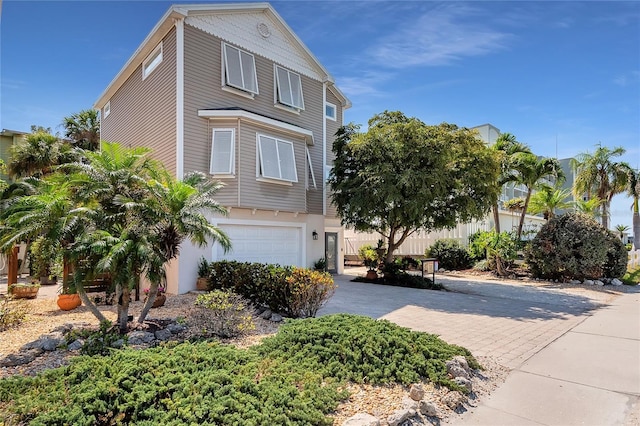 view of front of property with a garage