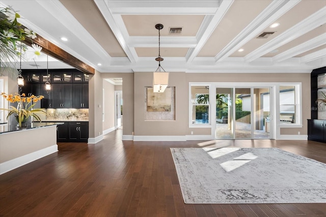 unfurnished living room featuring beam ceiling, coffered ceiling, dark hardwood / wood-style floors, and ornamental molding