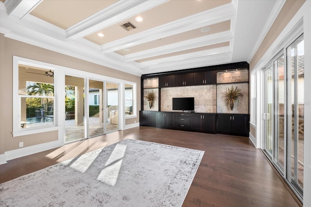 unfurnished sunroom featuring ceiling fan and beamed ceiling