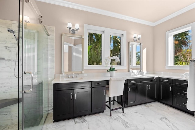 bathroom with vanity, an enclosed shower, and ornamental molding