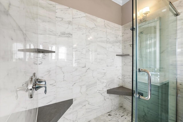 bathroom with a shower with shower door