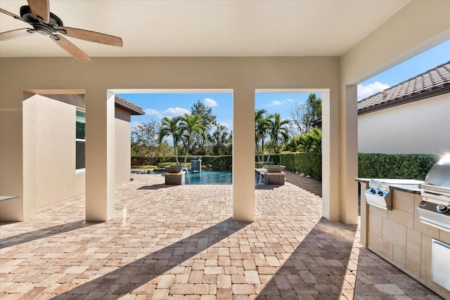 view of patio with pool water feature, a fenced in pool, area for grilling, and ceiling fan