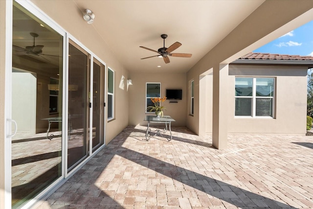 view of patio / terrace with ceiling fan