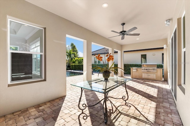 interior space featuring ceiling fan