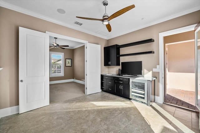 kitchen featuring light tile patterned floors, wine cooler, ceiling fan, and crown molding