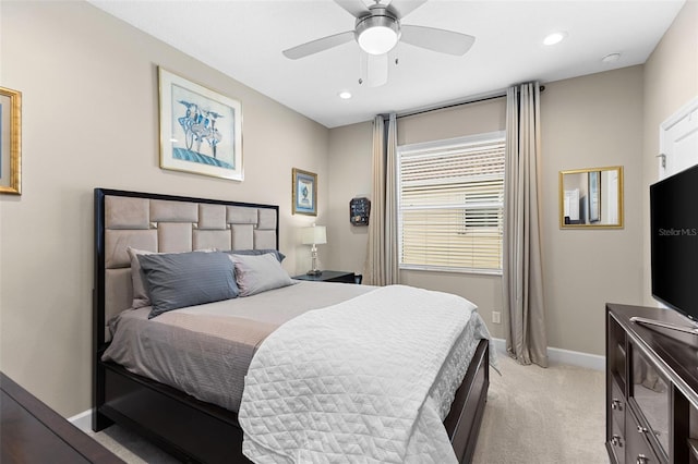 carpeted bedroom featuring ceiling fan