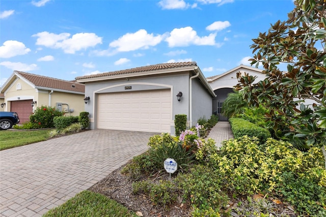 view of front of property with a garage