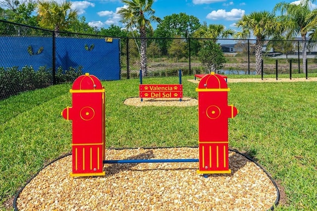 view of playground with a yard