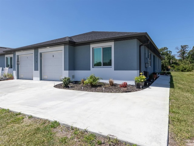 view of side of home with a garage