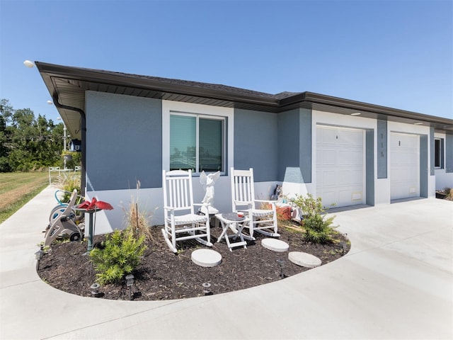 view of front of home with a garage