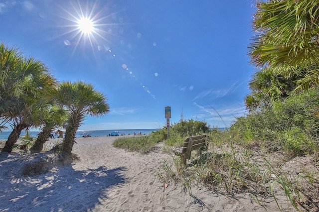 property view of water featuring a beach view