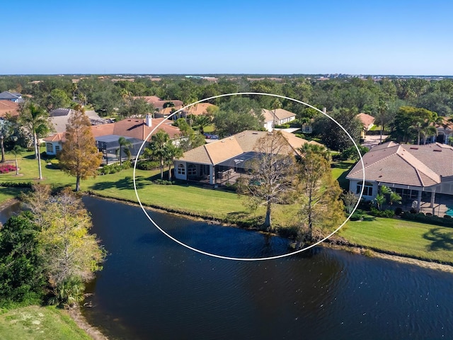 drone / aerial view with a water view