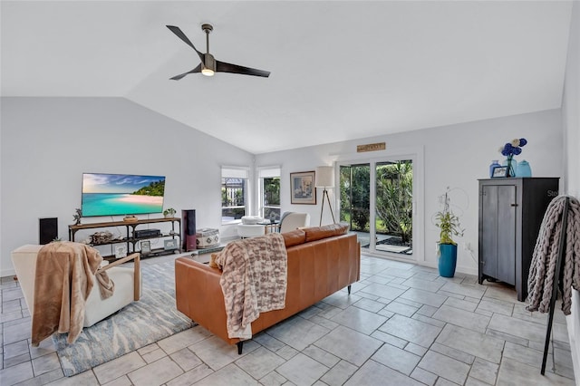 living room featuring ceiling fan and vaulted ceiling