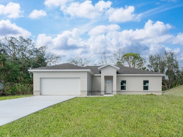 view of front facade with a garage and a front yard