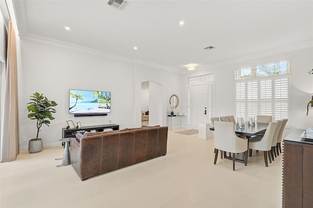 living room with ornamental molding