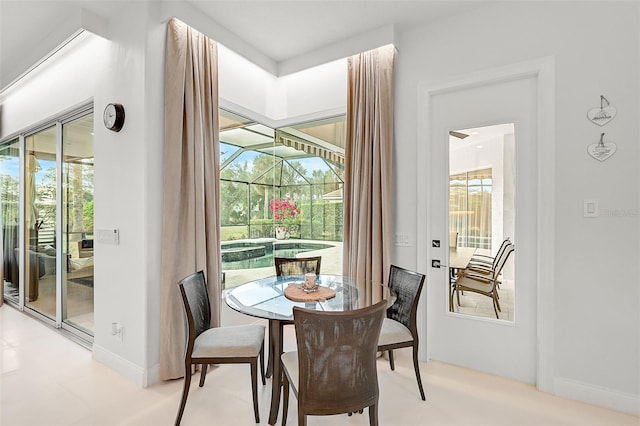2112 Calusa Lakes Blvd, Nokomis, FL 34275 - dining space featuring baseboards