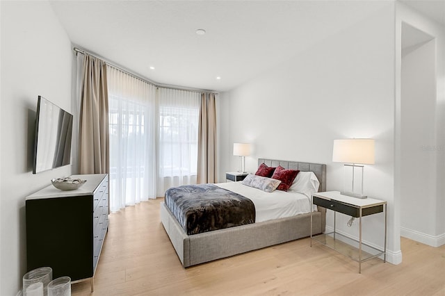 bedroom featuring light hardwood / wood-style floors