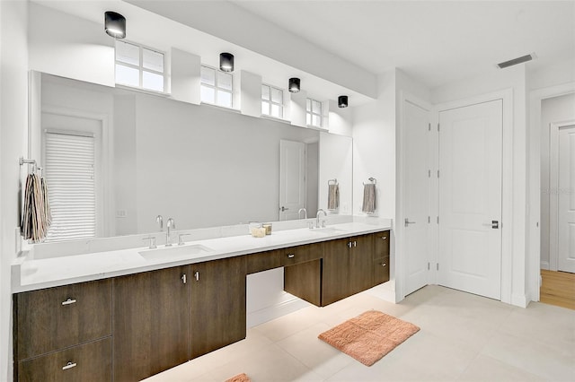 bathroom featuring vanity and tile patterned floors