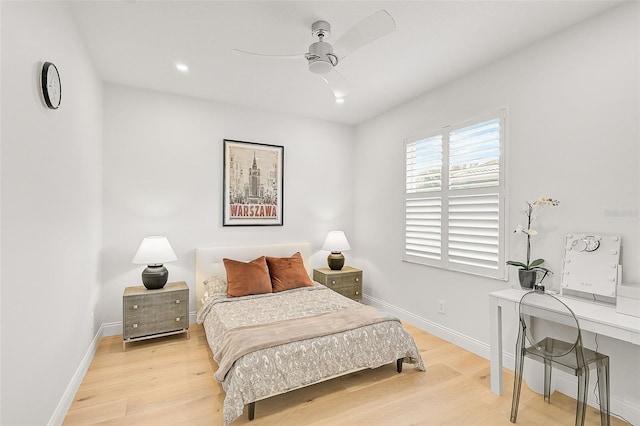 bedroom featuring ceiling fan and light wood-type flooring