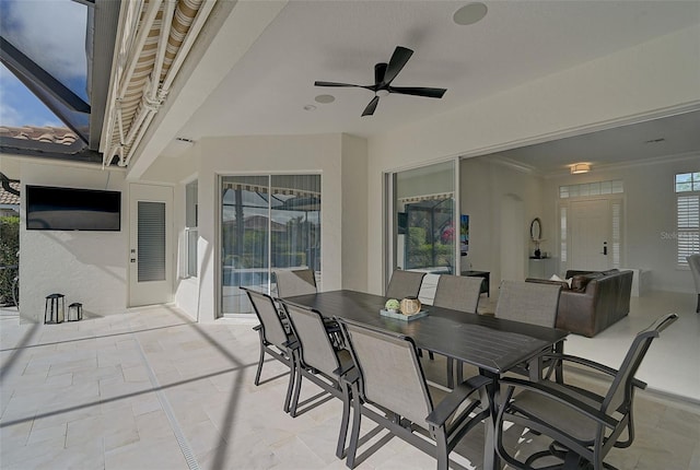 view of patio / terrace featuring ceiling fan