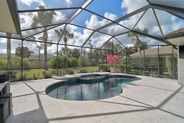 view of pool featuring glass enclosure, a patio area, and an in ground hot tub