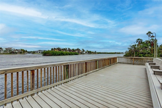 deck featuring a water view