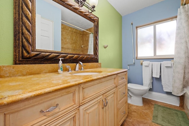 bathroom with tile patterned flooring, a shower with curtain, vanity, and toilet