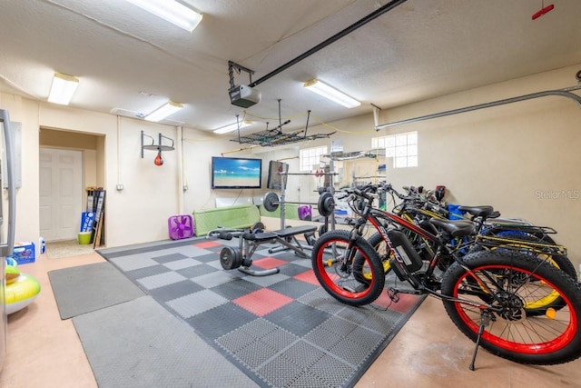 garage featuring a garage door opener