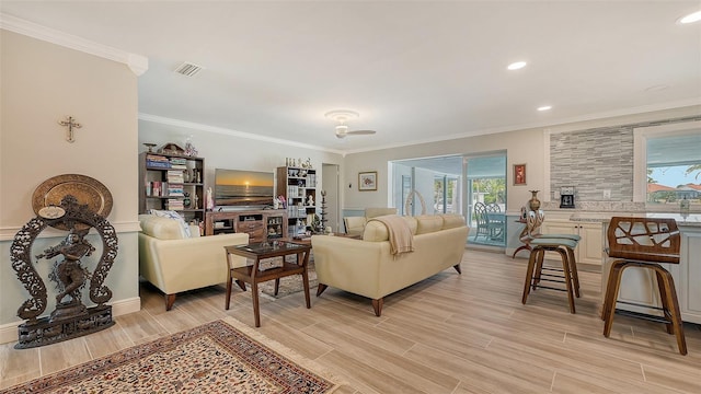 living room featuring ornamental molding