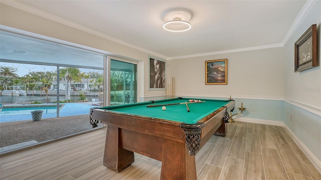 playroom with crown molding and pool table