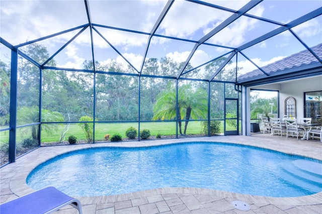 view of pool featuring a lanai and a patio area