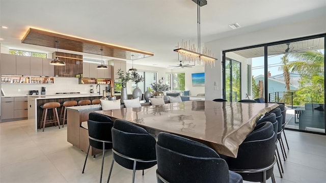 dining area with ceiling fan