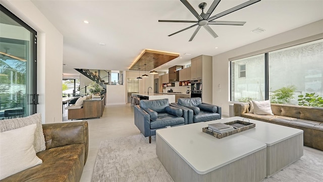 living room featuring ceiling fan