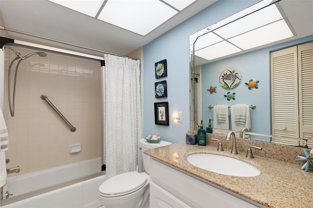 full bathroom featuring vanity, toilet, and shower / tub combo with curtain