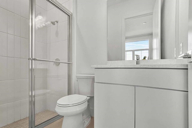 8007 Nevis Run, Bradenton, FL 34202 - full bath featuring toilet, a stall shower, and vanity