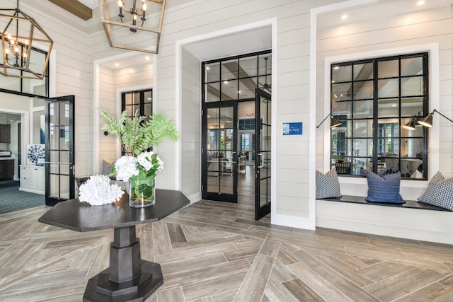 8007 Nevis Run, Bradenton, FL 34202 - building lobby featuring wood walls and a towering ceiling