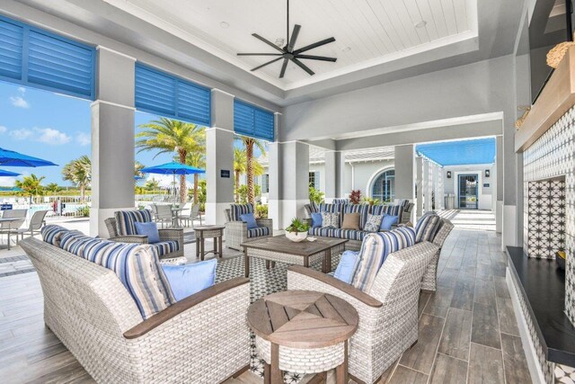 8007 Nevis Run, Bradenton, FL 34202 - view of patio with an outdoor living space, a ceiling fan, and outdoor dining space