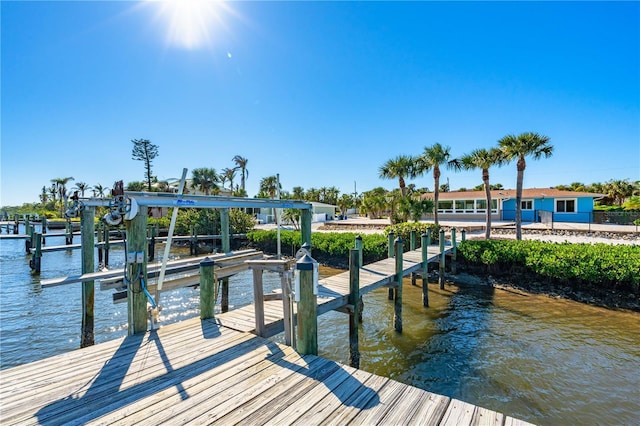 dock area featuring a water view