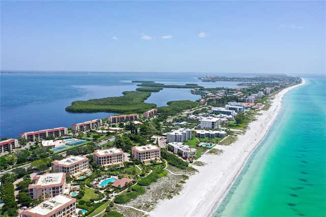 aerial view with a beach view and a water view