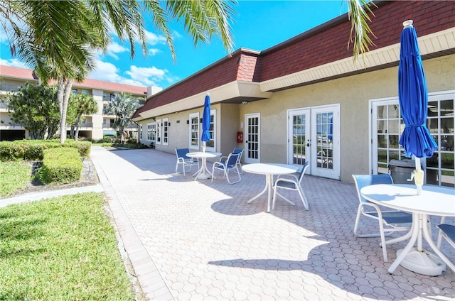 view of patio featuring french doors