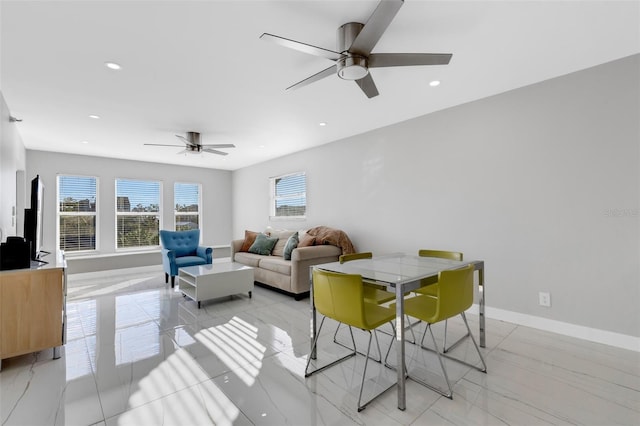 living room featuring ceiling fan