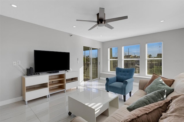 tiled living room with ceiling fan