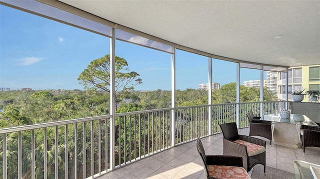 sunroom featuring a wealth of natural light