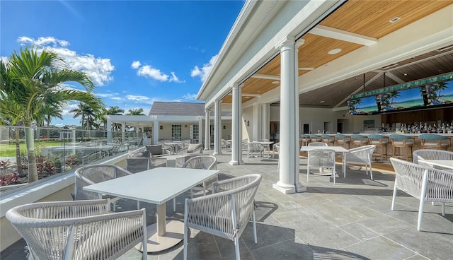 view of patio with a bar