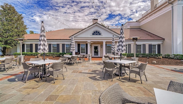 view of patio / terrace with ceiling fan