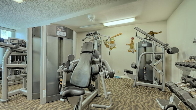 workout area with dark colored carpet